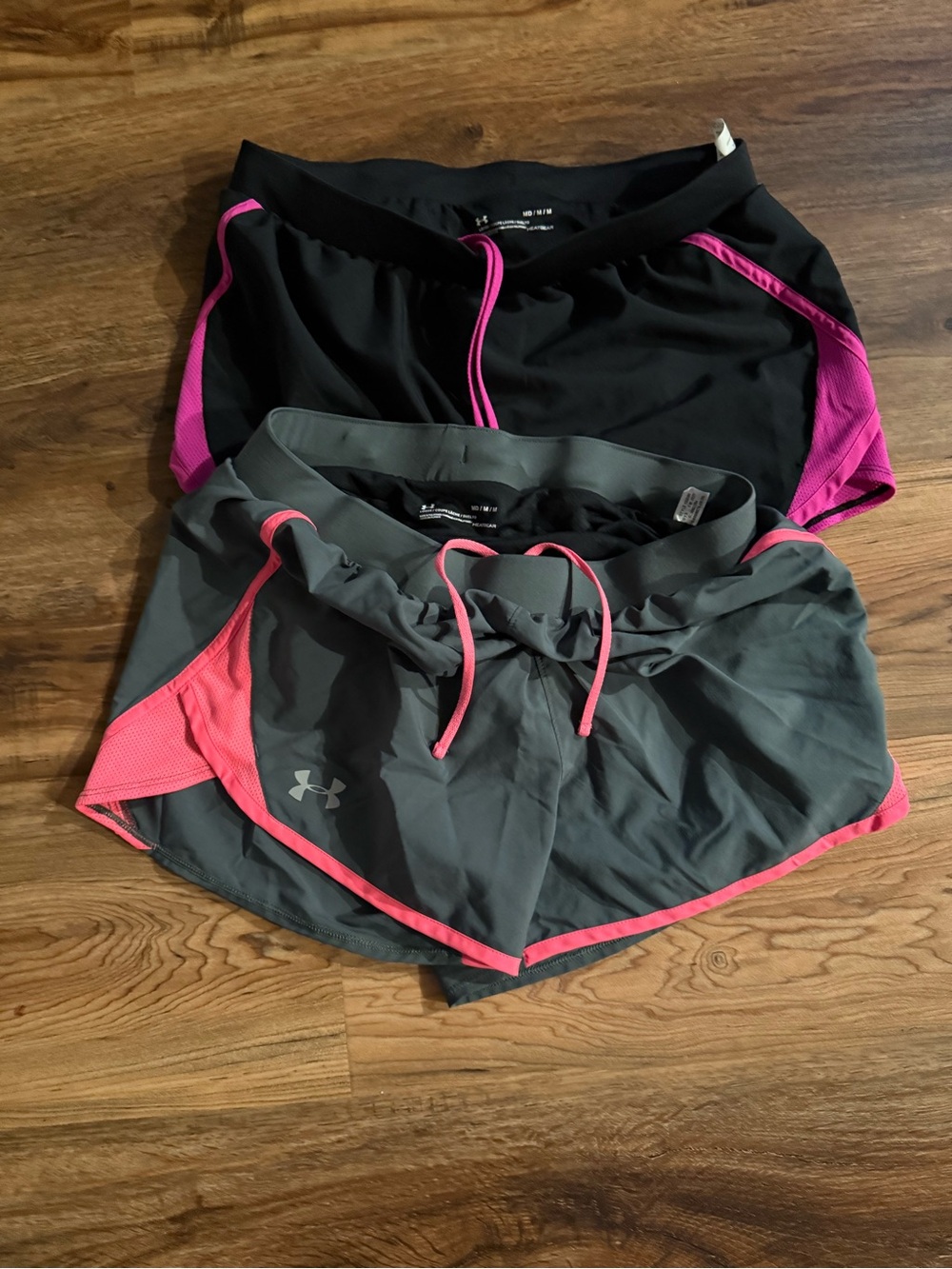 Under Armour Women’s Black and Gray Athletic Shorts with Pink Accents